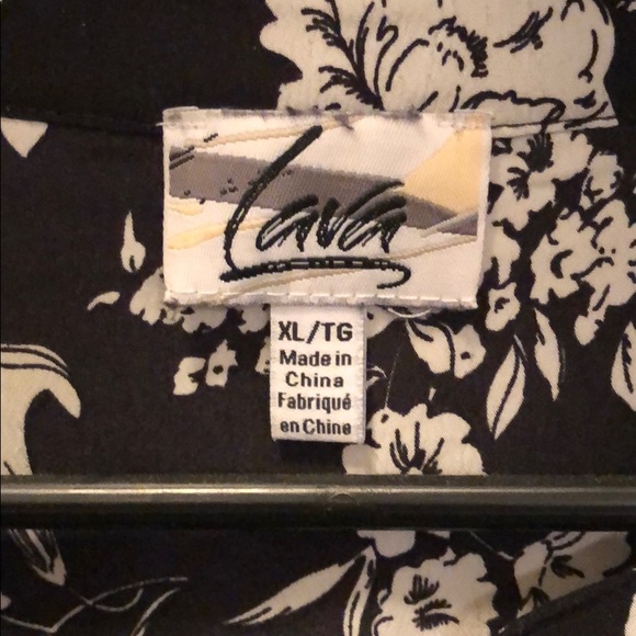 Black short sleeved top with white flowers. - Picture 3 of 4